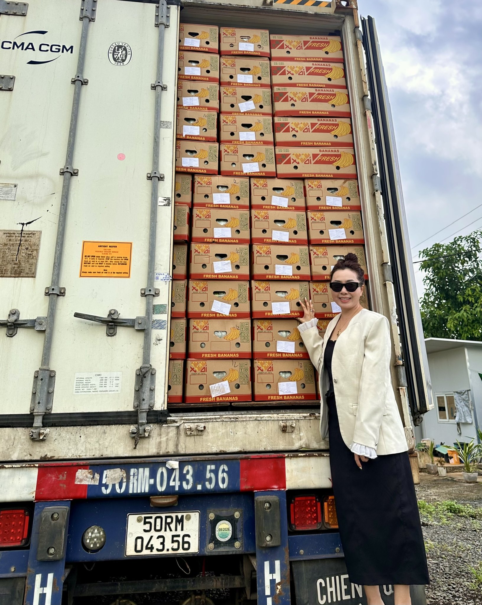 PNG ONE team loading a full container of fresh bananas for export